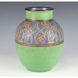 A Royal Doulton baluster vase decorated with flowers on a green ground 23cm