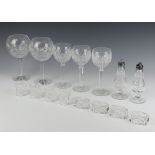 Three Waterford Crystal hock wine glasses, 2 large balloons, a pair of condiments, 4 circular napkin