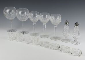 Three Waterford Crystal hock wine glasses, 2 large balloons, a pair of condiments, 4 circular napkin
