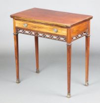 An Edwardian rectangular mahogany card table fitted a drawer with pierced apron, raised on square