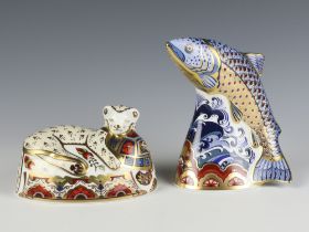 A Royal Crown Derby Imari pattern paperweight - lion cub no.371 of 1500 13cm and leaping salmon