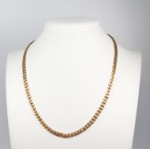 A yellow metal necklace 9.2 grams, 40cm