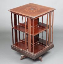 An Edwardian square inlaid and crossbanded mahogany 2 tier revolving bookcase the top with silver