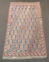 A 19th/20th Century Persian blue and tan ground rug with all over Boteh-Mir design 221cm x 125cm The