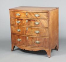 A 19th Century bleached mahogany bow front chest of 4 long graduated drawers with brass oval plate