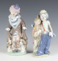 A Lladro group 7686 of a clown and lady 21cm, ditto clown 5901 24cm