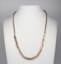 A yellow metal 555 twist necklace 19 grams, 44cm