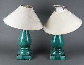 A pair of Chinese turquoise oviform table lamps on square bases 37cm