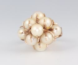 A 9ct yellow gold cultured pearl dress ring, 6.6 grams, size J