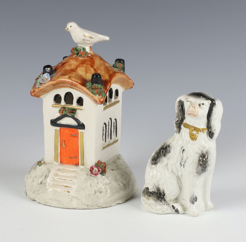 A Staffordshire style pastel burner in the form of a cottage 16cm, ditto Spaniel 11cm (cracked)