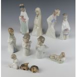 A Lladro Nativity group comprising Mary 19cm, Three Kings 22cm, 2 angels 4538 13cm, a kneeling