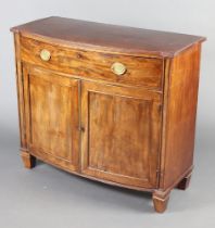 A Georgian mahogany bow front cabinet fitted 1 long drawer with replacement brass drop handles,