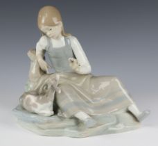 A Lladro group of girl with goat no.14756 25cm