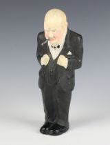 A plaster figure of Sir Winston Churchill with 1 lightable cigar 22cm This figure is restored