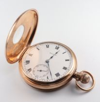 A 9ct yellow gold half hunter mechanical pocket watch the case numbered 246257, the dial and