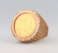 A 9ct yellow gold 1910 sovereign ring, the mount 5.7 grams, size R