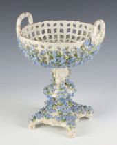 A 19th Century Continental tazza with applied flowers and pierced decoration 26cm There are numerous