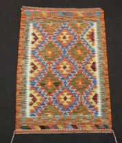 A yellow, blue and white Chobi Kilim with diamond design 123cm x 80cm