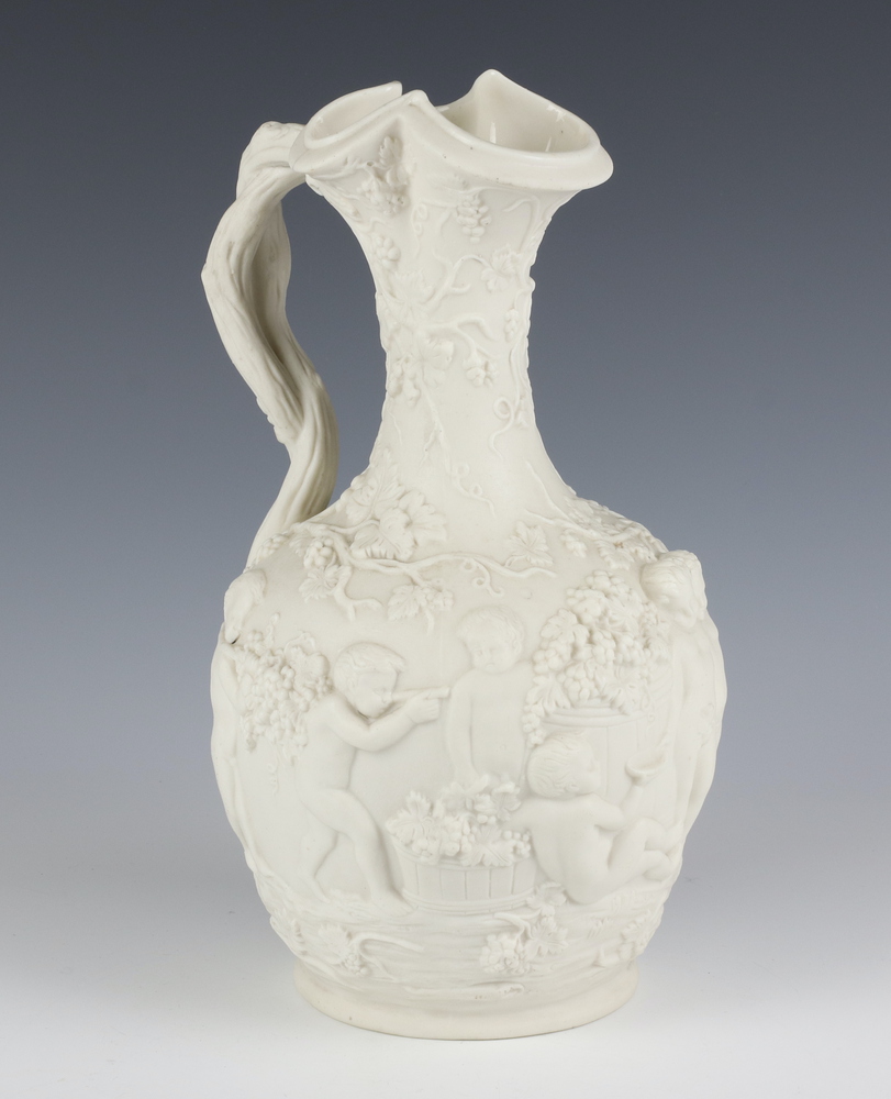 A Victorian Copeland parian jug decorated with a bacchanalian scene 26cm There is a crack to the lip