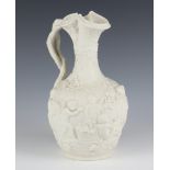 A Victorian Copeland parian jug decorated with a bacchanalian scene 26cm There is a crack to the lip