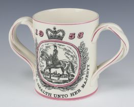 A Royal Doulton 1953 commemorative mug 14cm