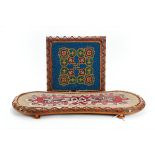 A VICTORIAN BEADWORK TABLE TOP STAND with stylised shamrock carved Walnut surround on turned feet,