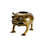 A 19TH CENTURY CHINESE BRONZE INCENSE BURNER in the form of mythical three legged toad, 13cms high.