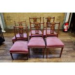 AN EDWARDIAN INLAID MAHOGANY SUITE OF SIX PARLOUR CHAIRS with vase inlaid splats, stuff-over seats,