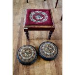A PAIR OF VICTORIAN CIRCULAR EBONIZED FOOTSTOOLS with beadwork upholstery and a square pitch pine