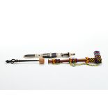 A VINTAGE ZULU WOOD SMOKING PIPE with beaded decoration,
