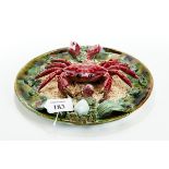 A PORTUGESE "PALISSY" WARE TYPE WALL PLATE with central large red crab & shell/seaweed border,