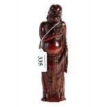 AN 18TH CENTURY CHINESE BAMBOO CARVING OF A MONK,