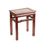 AN 18TH/19TH CHINESE HARDWOOD TABLE, raised on square legs united by shaped stretchers, 42 x 30cms.