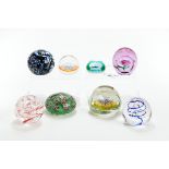 AN ITALIAN MURANO GLASS PAPERWEIGHT, inset with Millefiori trees,