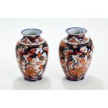 A PAIR OF LATE 19TH CENTURY JAPANESE IMARI PORCELAIN VASES of ovoid form,