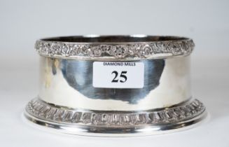 An Elkington's white metal circular decanter coaster with foliate rim & gadrooned base, marked