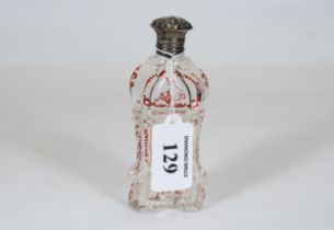 A 19th Century Bohemian ruby-flash cut glass scent bottle decorated with running deer, internal