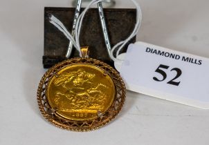 A Queen Victoria 1887 double sovereign (£2) Jubilee head, George & Dragon in a 9ct gold pendant