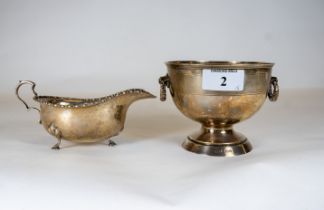 A small silver bowl with ring handles, Birmingham 1913, and a silver sauce boat, Birmingham, mark