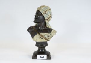 A late 19th century cold painted copper bust of an Arab on an integral socle base, 23.5cms high, £40