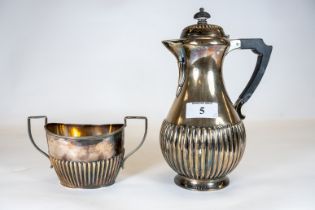 A Victorian Scottish silver hot water jug Edinburgh 1889, 12 ozs & a silver sugar basin Birmingham
