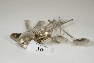 A set of twelve late 19th century Russian white metal spoons with spiral twist handles, 84 mark,