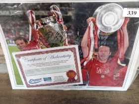 Football interest an autographed Ryan Giggs photograph taken at Champions League Trophy event £