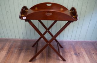 A 20th century mahogany Georgian revival snap sided butler's tray ,75 x 50cms on a folding stand,