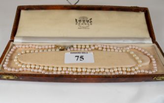 A Cultured pearl necklace with 14k white gold clasp, 36cms and a cultured pink pearl necklace with
