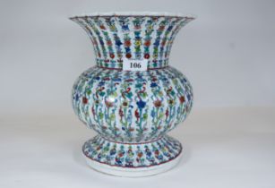 A 20th century Chinese Ming style Doucai vase of ribbed mosque lamp form decorated with polychrome