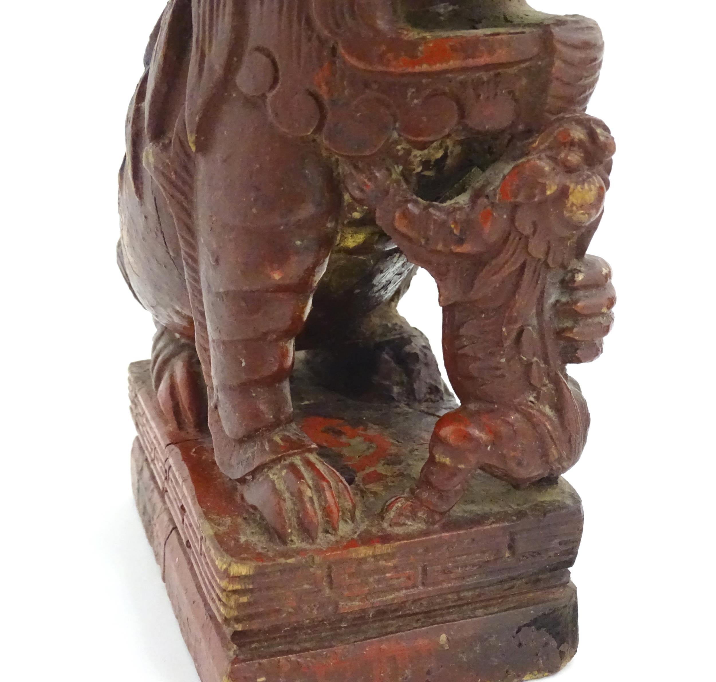 Two Chinese carved wooden foo dogs / guardian lions, one with a cub, the other with a ball, with - Image 8 of 9