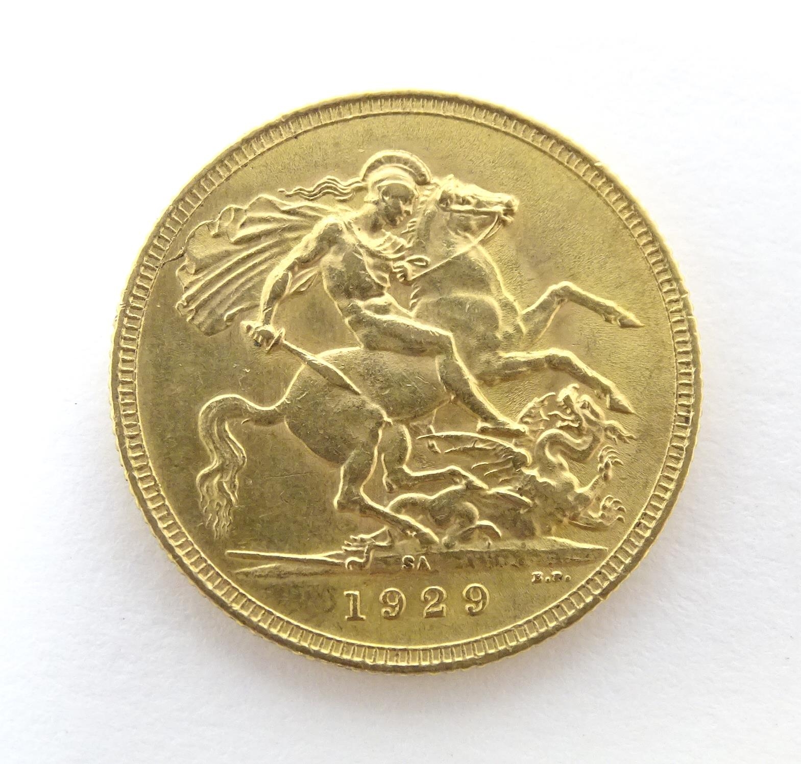 Coin : A George V 1929 gold sovereign coin. Total weight approx. 8g Please Note - we do not make - Image 3 of 5