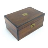 A Victorian walnut writing slope / box with brass banding and fitted interior. Approx. 6 1/2" high x