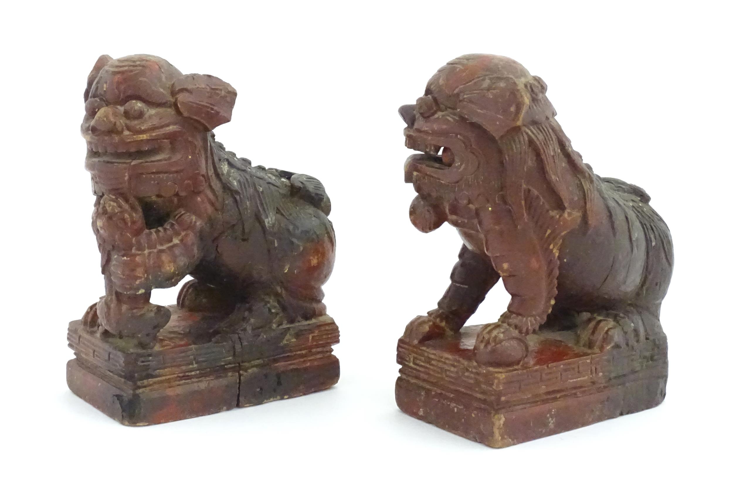 Two Chinese carved wooden foo dogs / guardian lions, one with a cub, the other with a ball, with - Image 2 of 9